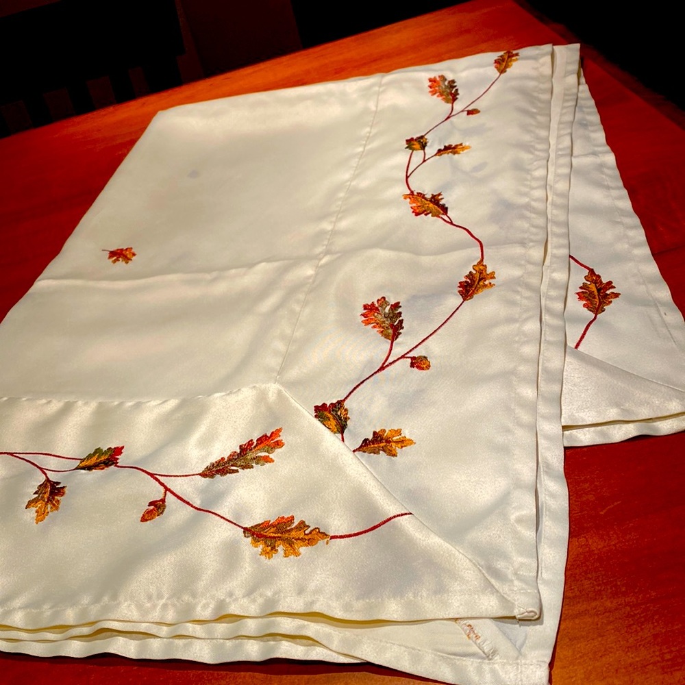 Beautiful polyester tablecloth with leaf and acorn embroidery on it Perfect